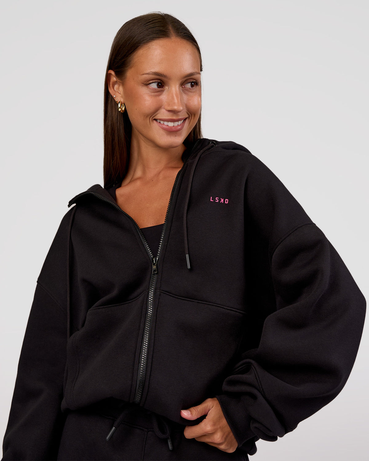 Woman wearing Love The Process Zip Through Hoodie - Black-Sugar Plum | Model:Brylee | Size:XS