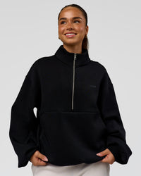 Woman wearing Luxe ZeroCrease Spacer Half Zip - Black | Model:Sophia | Size:XS | Thumbnail Index: 5