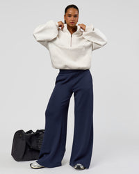 Woman wearing Luxe ZeroCrease Spacer Half Zip - Silver Marl | Model:Sophia | Size:XS | Thumbnail Index: 6