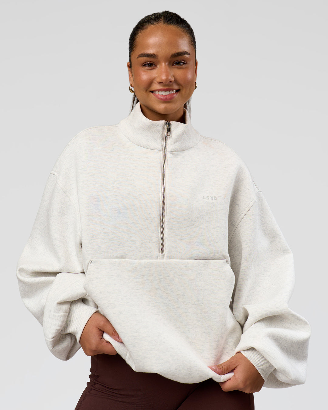 Woman wearing Luxe ZeroCrease Spacer Half Zip - Silver Marl | Model:Sophia | Size:XS - view 9