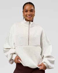 Woman wearing Luxe ZeroCrease Spacer Half Zip - Silver Marl | Model:Sophia | Size:XS | Thumbnail Index: 8