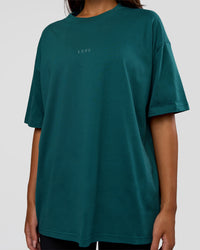Woman wearing MVP 2.0 Oversized Tee - Transformative Teal | Model:Kirstyn | Size:XS | Thumbnail Index: 10