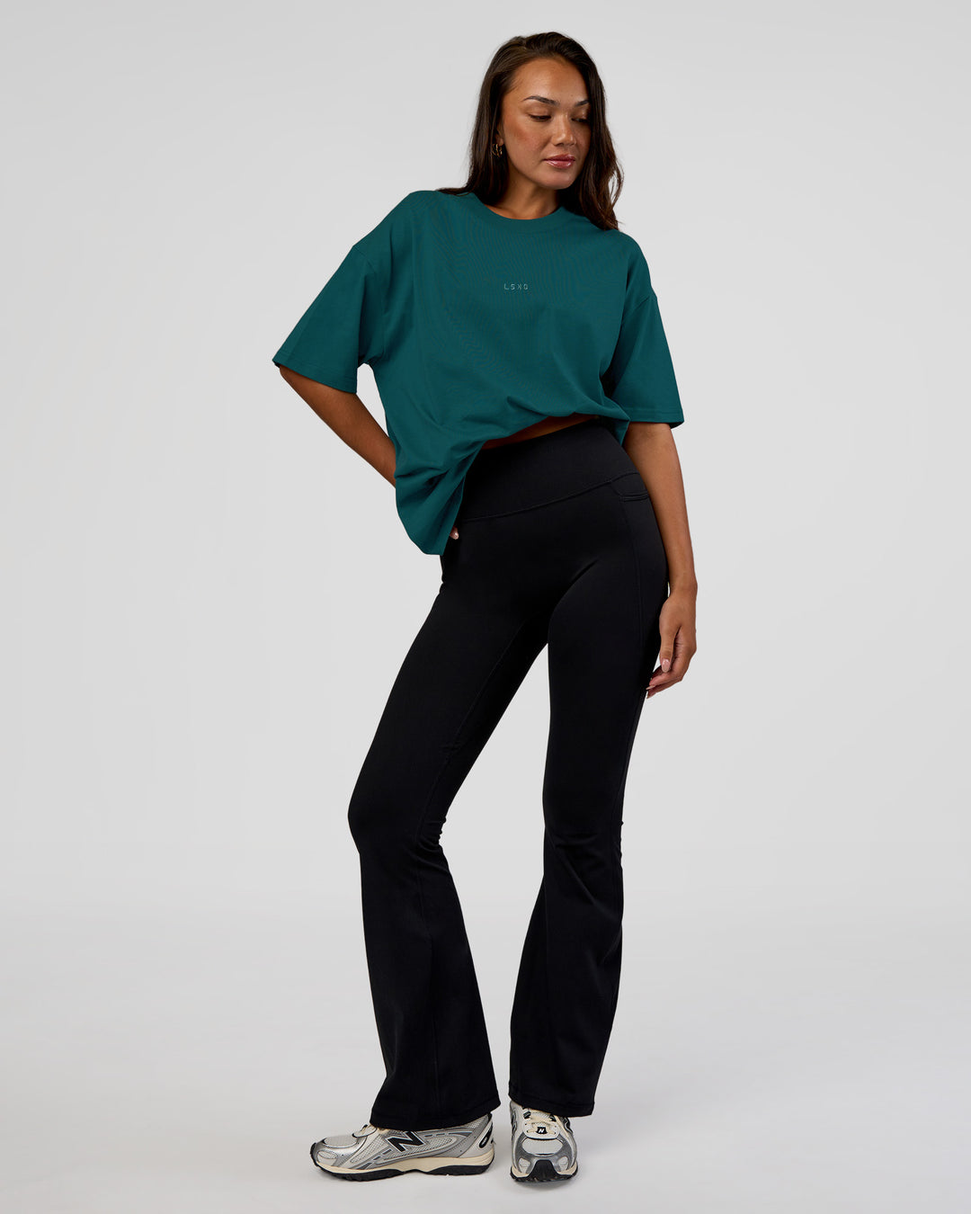 Woman wearing MVP 2.0 Oversized Tee - Transformative Teal | Model:Kirstyn | Size:XS - view 5