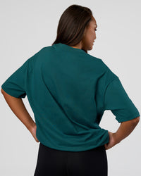 Woman wearing MVP 2.0 Oversized Tee - Transformative Teal | Model:Kirstyn | Size:XS | Thumbnail Index: 6