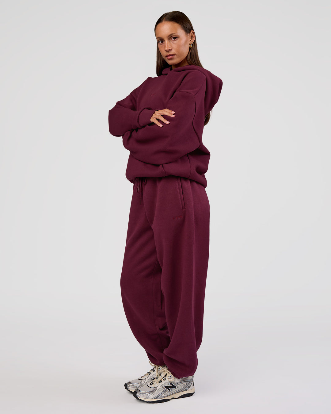 Woman wearing MVP Oversized Hoodie - Cherry Lacquer | Model:Brylee | Size:XS - view 7