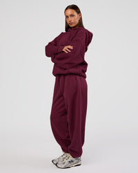 Woman wearing MVP Oversized Hoodie - Cherry Lacquer | Model:Brylee | Size:XS | Thumbnail Index: 6
