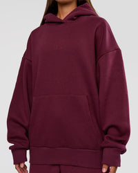 Woman wearing MVP Oversized Hoodie - Cherry Lacquer | Model:Brylee | Size:XS | Thumbnail Index: 10