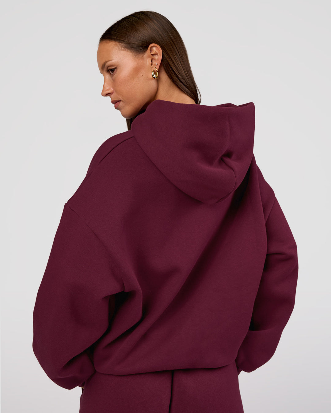 Woman wearing MVP Oversized Hoodie - Cherry Lacquer | Model:Brylee | Size:XS - view 6