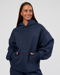 Woman wearing MVP Oversized Hoodie - Future Navy | Model:Brylee | Size:XS | Thumbnail Index: 3