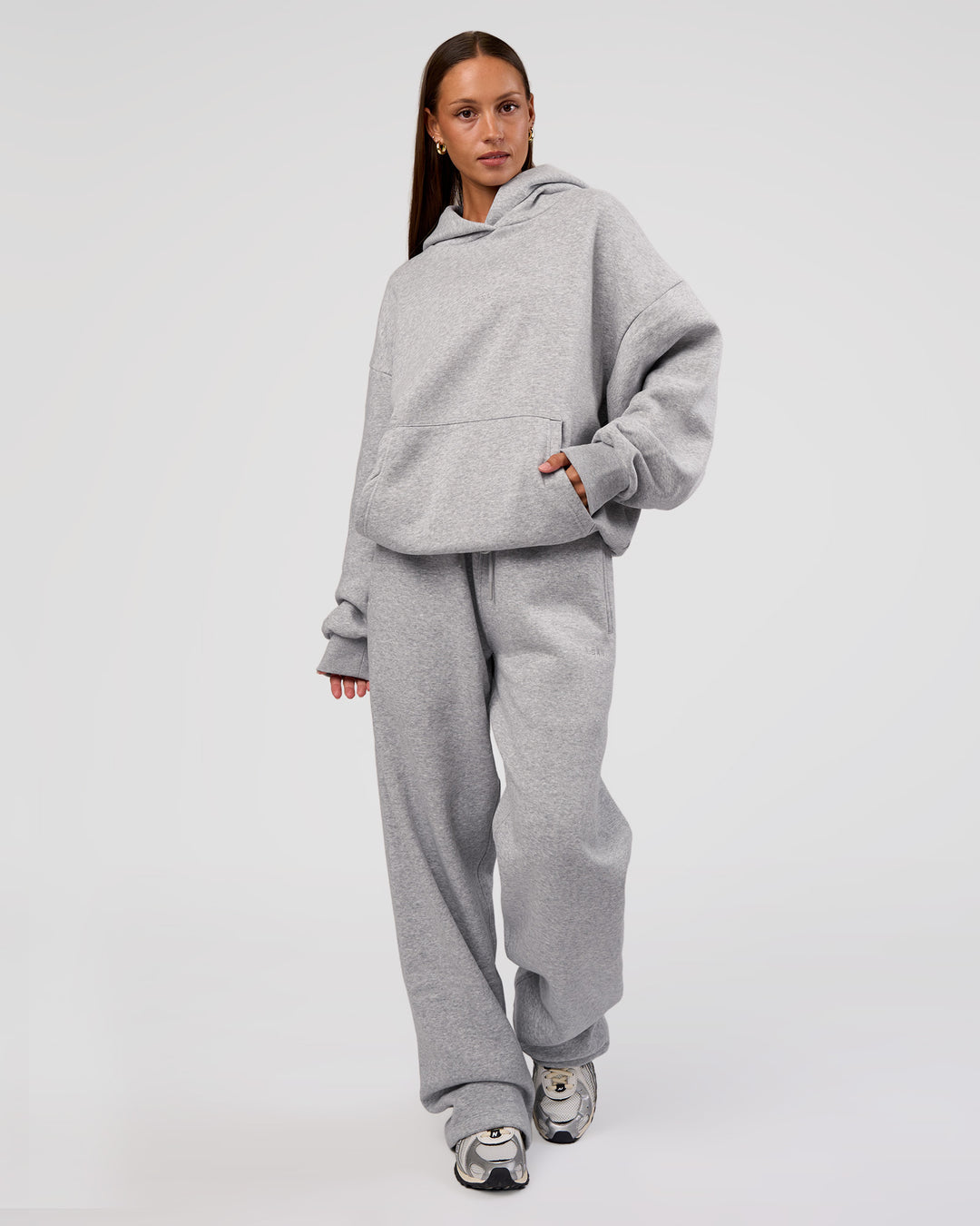 Woman wearing MVP Oversized Hoodie - Light Grey Marl | Model:Brylee | Size:XS - view 4