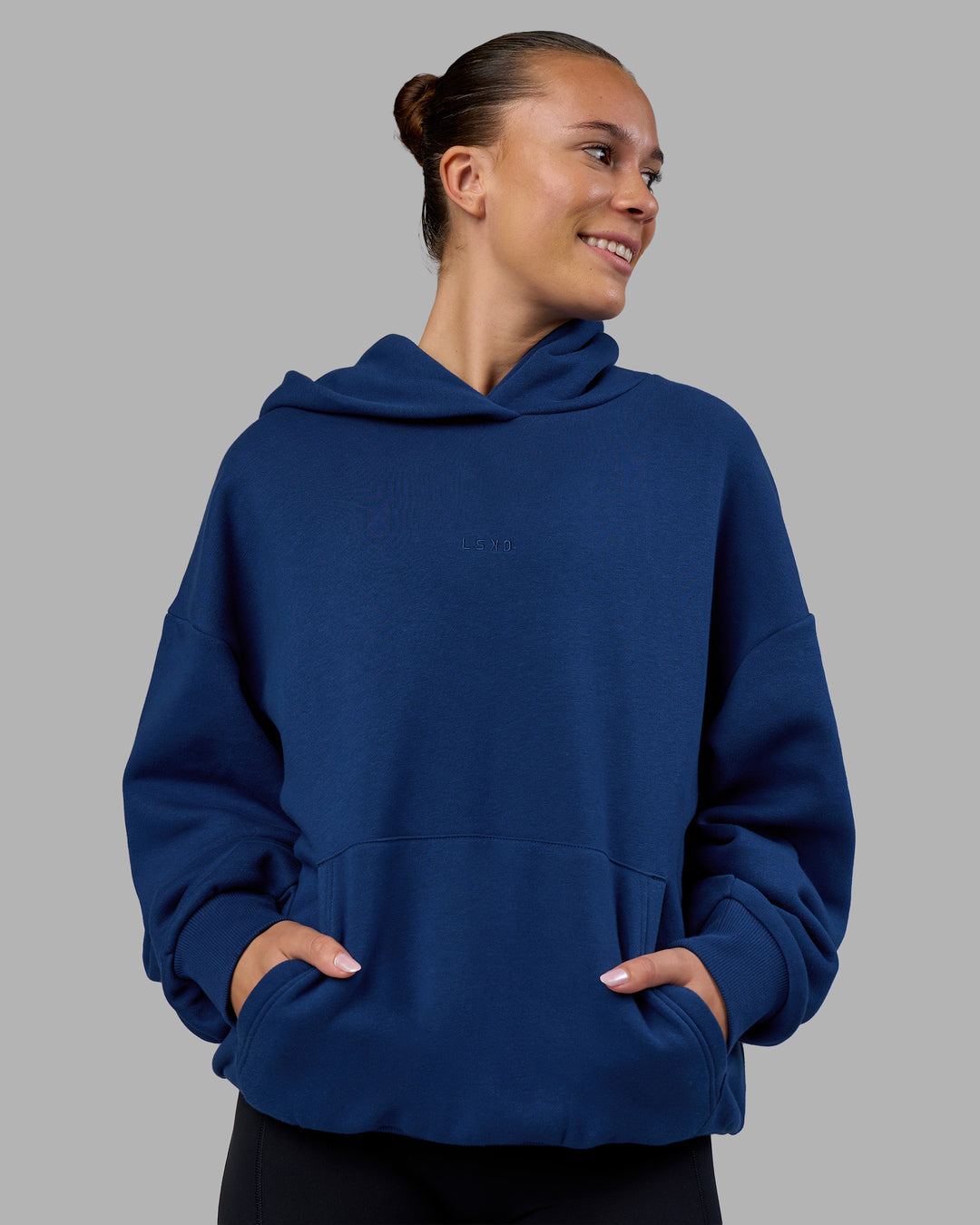 Woman wearing MVP Oversized Hoodie - Midnight Blue | Model:Charlize | Size:XS - view 3