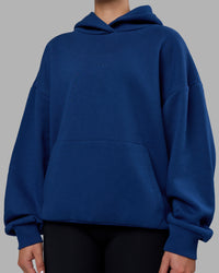 Woman wearing MVP Oversized Hoodie - Midnight Blue | Model:Charlize | Size:XS | Thumbnail Index: 6