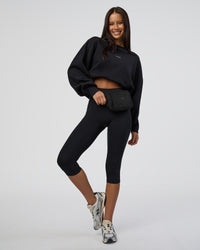 Woman wearing MVP Oversized Sweater - Black-White | Model:Eliza | Size:XS | Thumbnail Index: 1