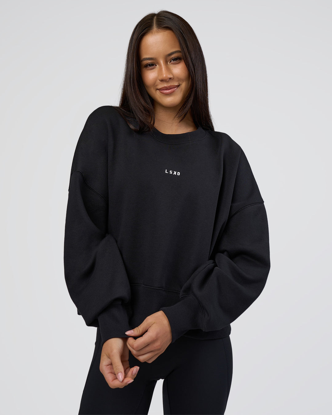 Woman wearing MVP Oversized Sweater - Black-White | Model:Eliza | Size:XS - view 1