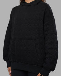 Woman wearing MVP Quilted Oversized Hoodie - Black-Geometric | Model:Phoebe | Size:XS | Thumbnail Index: 4