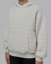Woman wearing MVP Quilted Oversized Hoodie - Digital Mist-Geometric | Model:Lyss | Size:XS | Thumbnail Index: 8