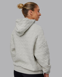 Woman wearing MVP Quilted Oversized Hoodie - Digital Mist-Geometric | Model:Lyss | Size:XS | Thumbnail Index: 3