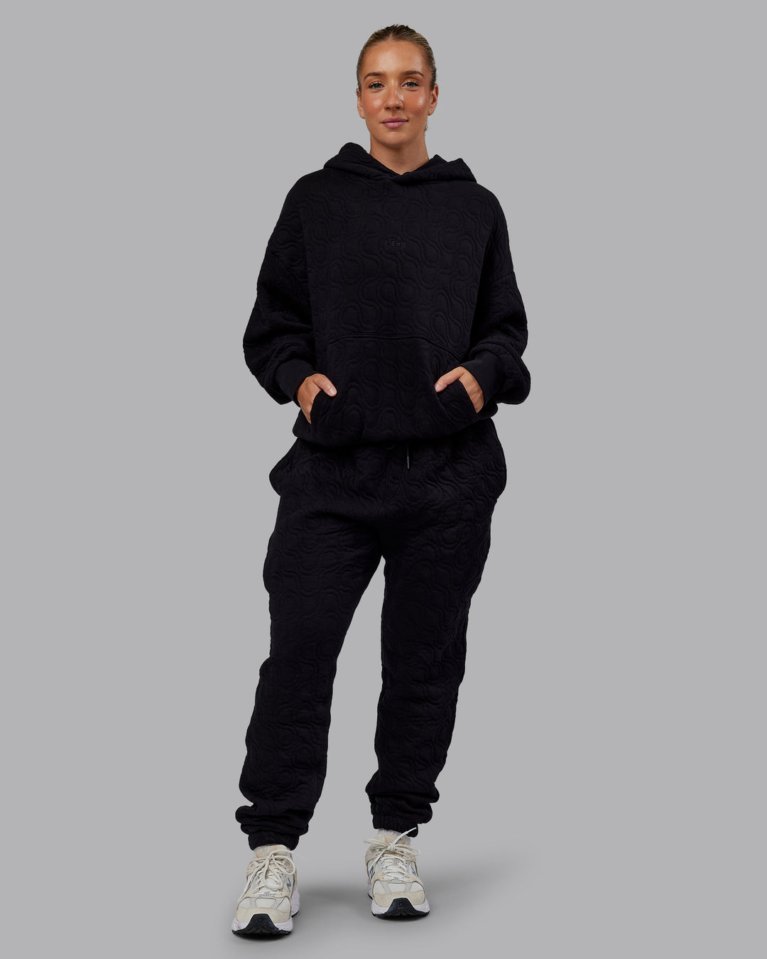 Woman wearing MVP Quilted Track Pant - Black-Geometric | Model:Lyss | SIze:XS - view 15