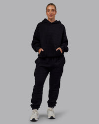 Woman wearing MVP Quilted Track Pant - Black-Geometric | Model:Lyss | SIze:XS | Thumbnail Index: 14