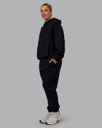 Woman wearing MVP Quilted Track Pant - Black-Geometric | Model:Lyss | SIze:XS | Thumbnail Index: 16