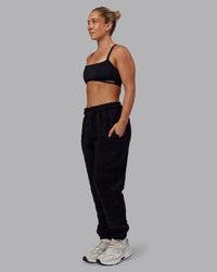 Woman wearing MVP Quilted Track Pant - Black-Geometric | Model:Lyss | SIze:XS | Thumbnail Index: 7