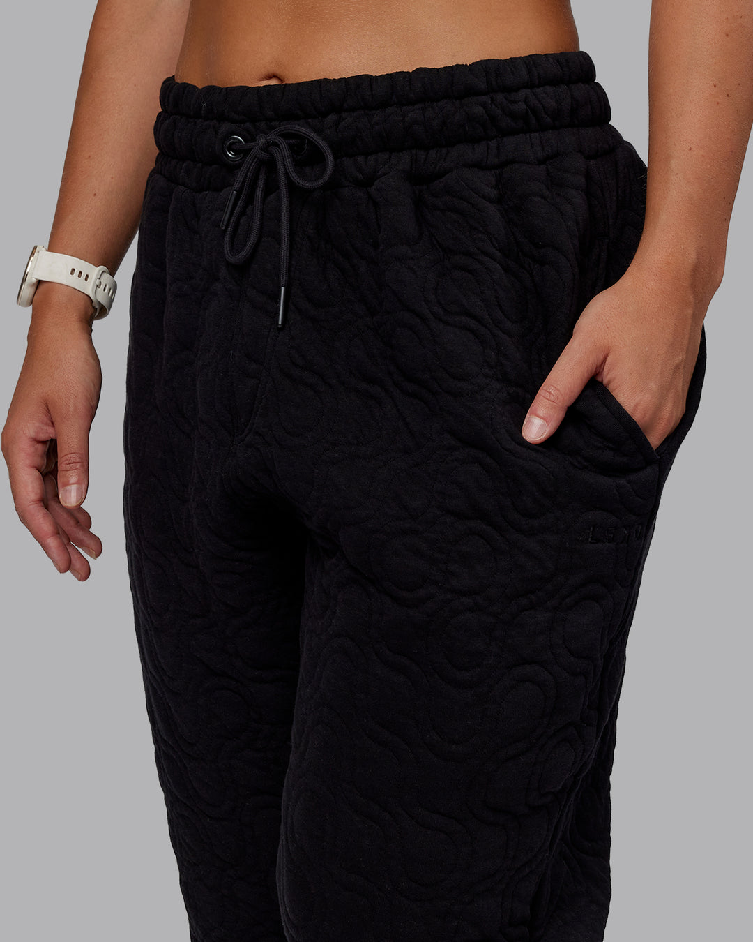 Woman wearing MVP Quilted Track Pant - Black-Geometric | Model:Lyss | SIze:XS - view 12