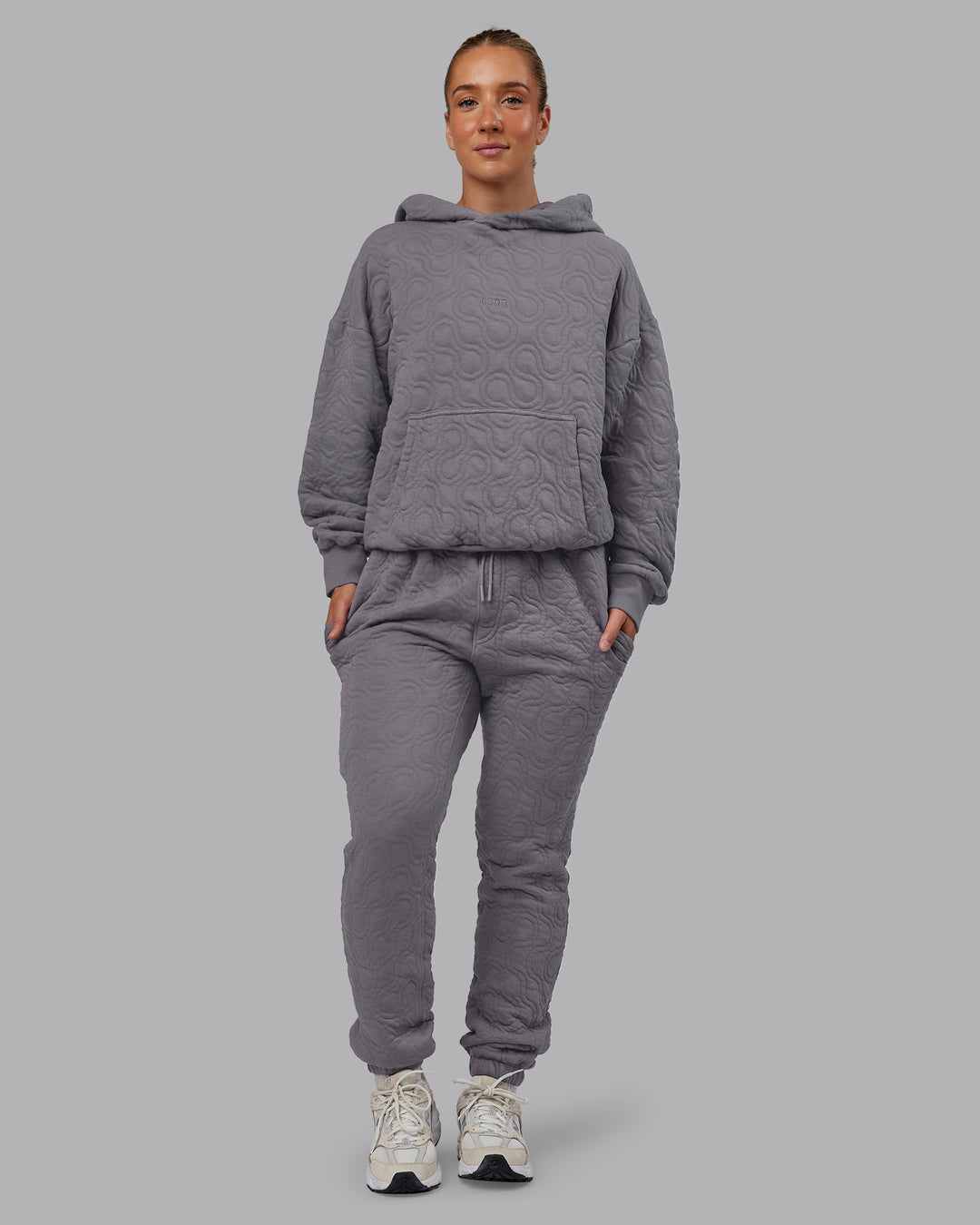 Woman wearing MVP Quilted Track Pant - Storm Front-Geometric | Model:Lyss | Size:XS - view 7