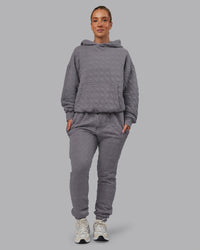 Woman wearing MVP Quilted Track Pant - Storm Front-Geometric | Model:Lyss | Size:XS | Thumbnail Index: 6
