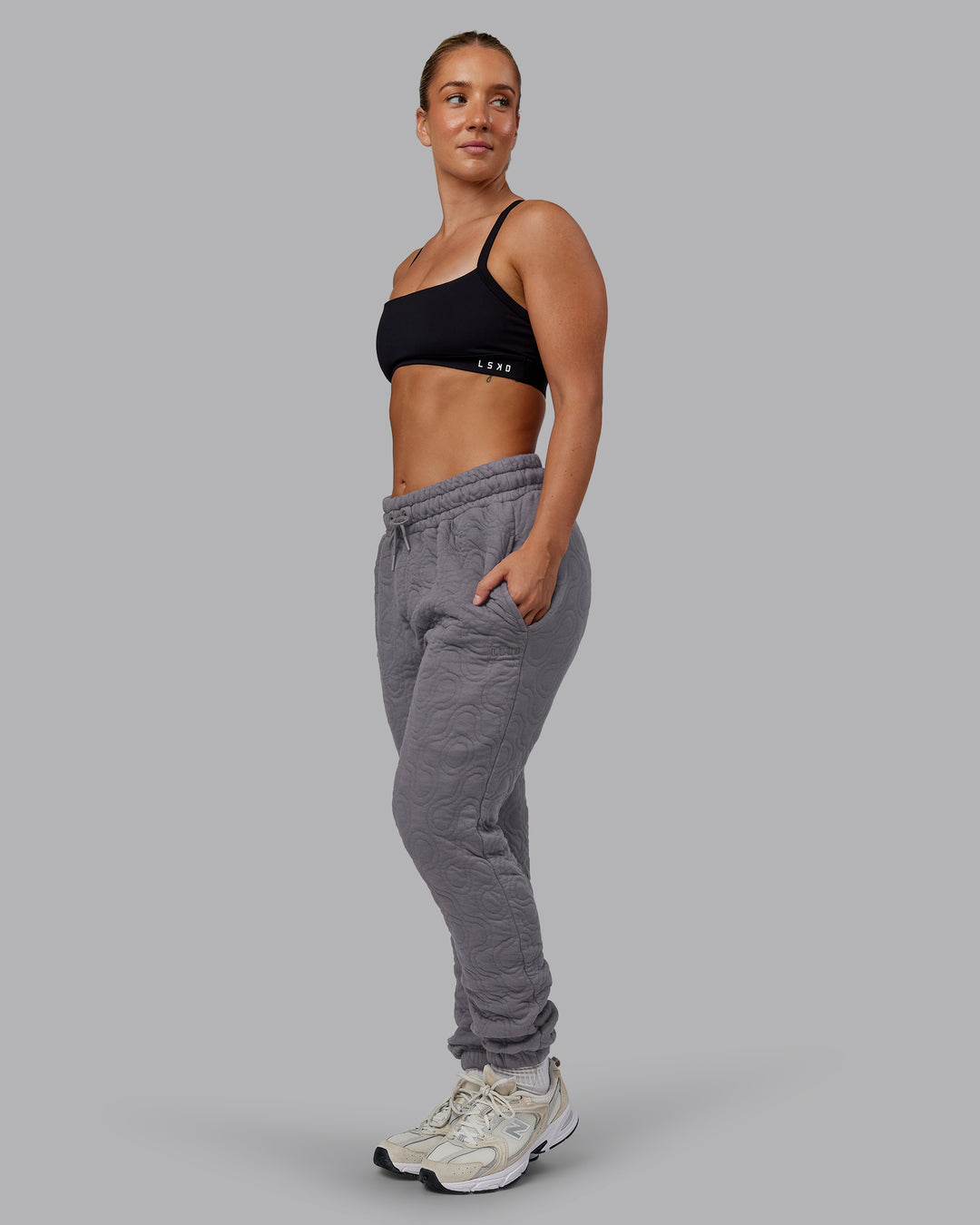 Woman wearing MVP Quilted Track Pant - Storm Front-Geometric | Model:Lyss | Size:XS - view 11