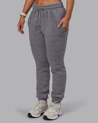 Woman wearing MVP Quilted Track Pant - Storm Front-Geometric | Model:Lyss | Size:XS | Thumbnail Index: 16