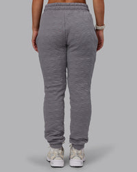 Woman wearing MVP Quilted Track Pant - Storm Front-Geometric | Model:Lyss | Size:XS | Thumbnail Index: 3