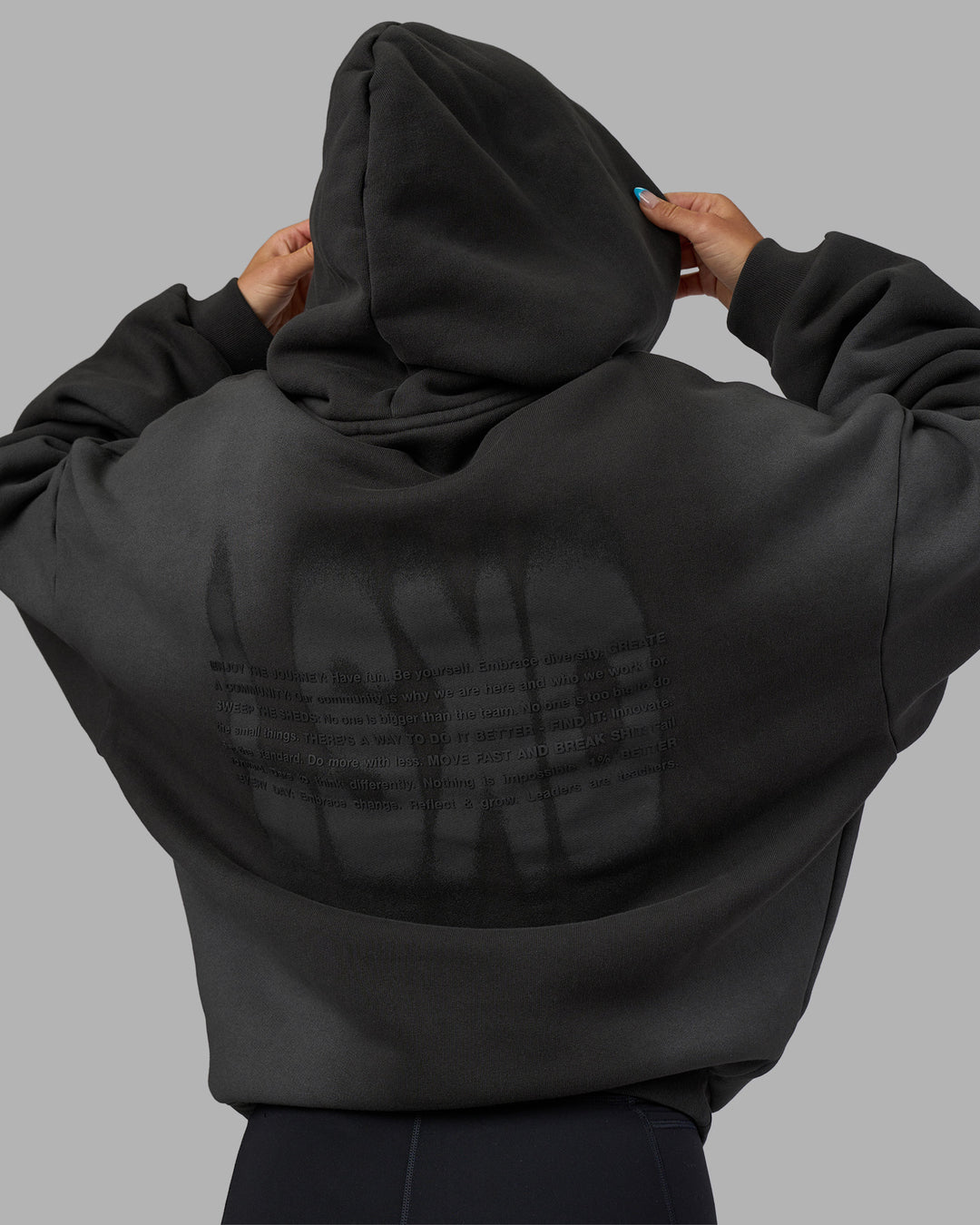 Woman wearing Memory In Motion 500gsm Ultra Heavyweight Washed Hoodie - Charcoal Washed | Model:Alex | Size:XS - view 20