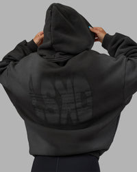 Woman wearing Memory In Motion 500gsm Ultra Heavyweight Washed Hoodie - Charcoal Washed | Model:Alex | Size:XS | Thumbnail Index: 19