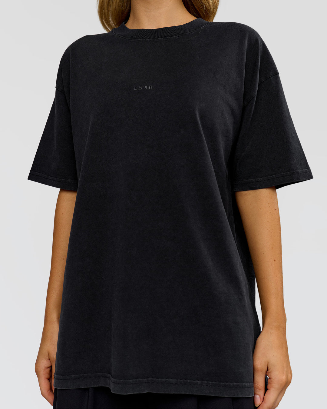 Woman wearing Memory in Motion Heavyweight Oversized Tee - Black Washed | Model:Leilani | Size:XS - view 9