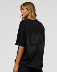 Woman wearing Memory in Motion Heavyweight Oversized Tee - Black Washed | Model:Leilani | Size:XS | Thumbnail Index: 3