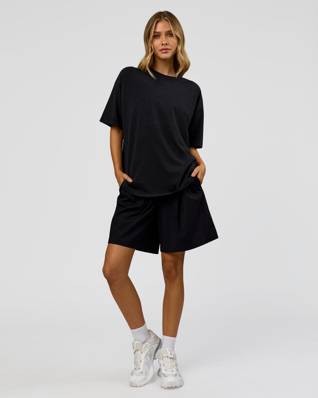 Woman wearing Memory in Motion Heavyweight Oversized Tee - Black Washed | Model:Leilani | Size:XS - view 11