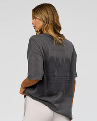 Woman wearing Memory in Motion Heavyweight Oversized Tee - Dark Storm Washed | Model:Leilani | Size:XS | Thumbnail Index: 3