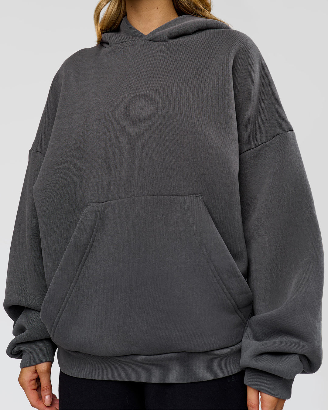 Woman wearing Memory In Motion Ultra Heavyweight Washed Hoodie - Dark Storm Washed | Model:Leilani | Size:XS - view 16