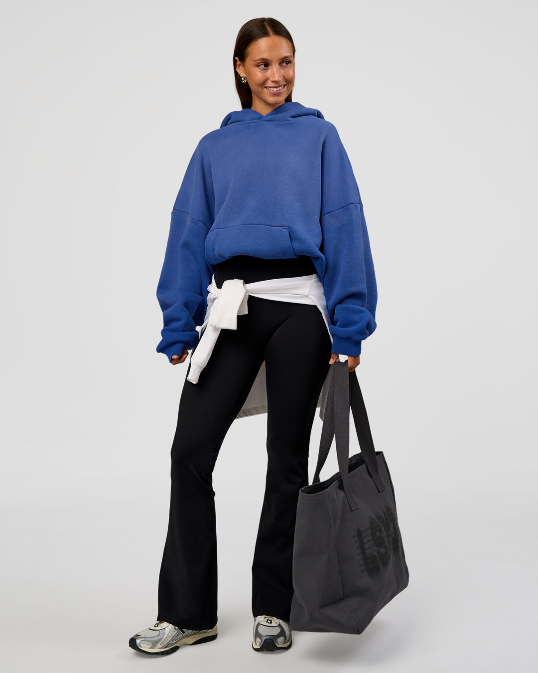 Woman wearing Memory In Motion Ultra Heavyweight Washed Hoodie - Electric Indigo Washed | Model:Brylee | Size:XS - view 8