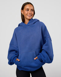 Woman wearing Memory In Motion Ultra Heavyweight Washed Hoodie - Electric Indigo Washed | Model:Brylee | Size:XS | Thumbnail Index: 4