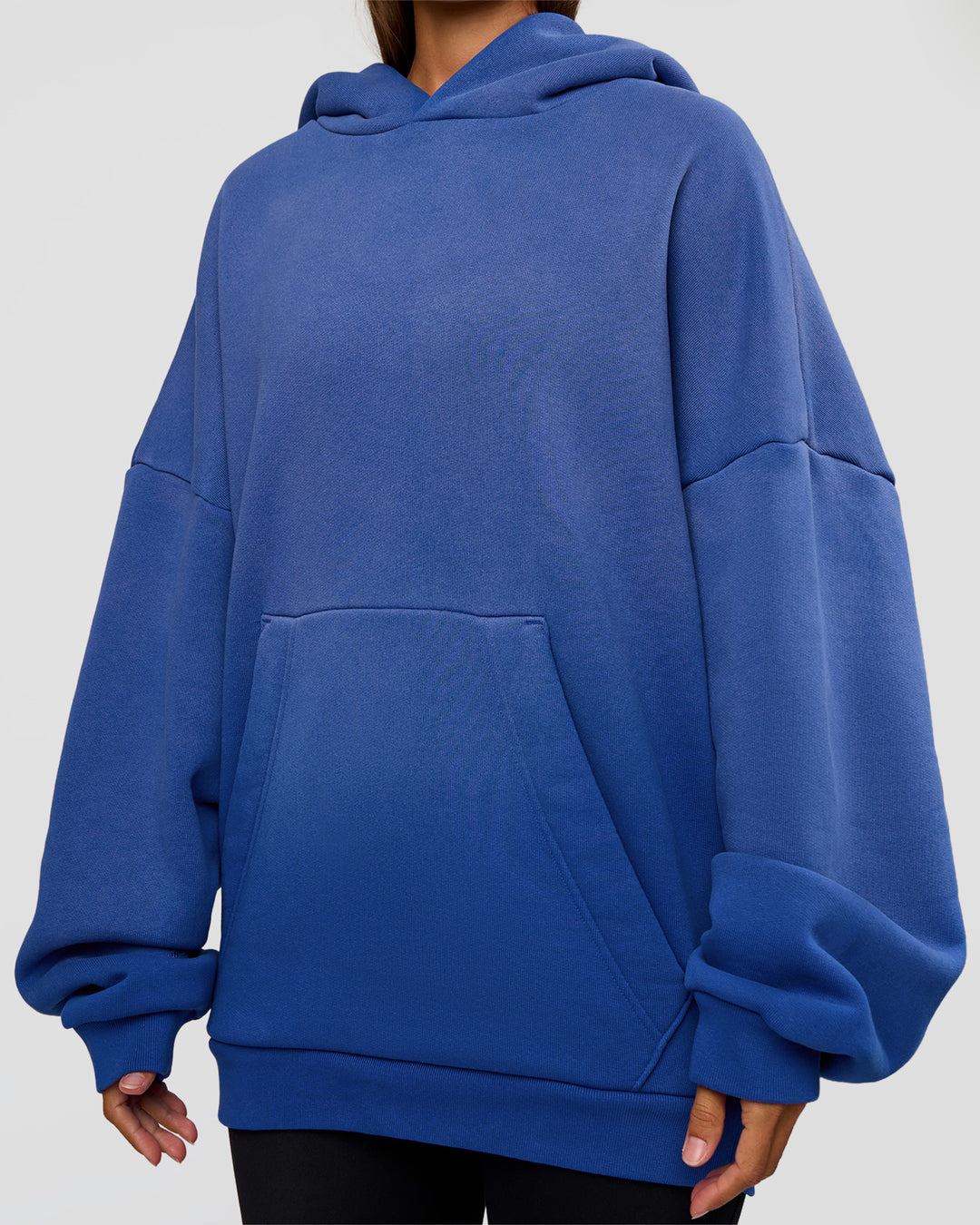 Woman wearing Memory In Motion Ultra Heavyweight Washed Hoodie - Electric Indigo Washed | Model:Brylee | Size:XS - view 9