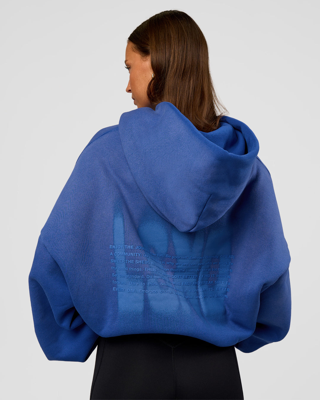 Woman wearing Memory In Motion Ultra Heavyweight Washed Hoodie - Electric Indigo Washed | Model:Brylee | Size:XS - view 4