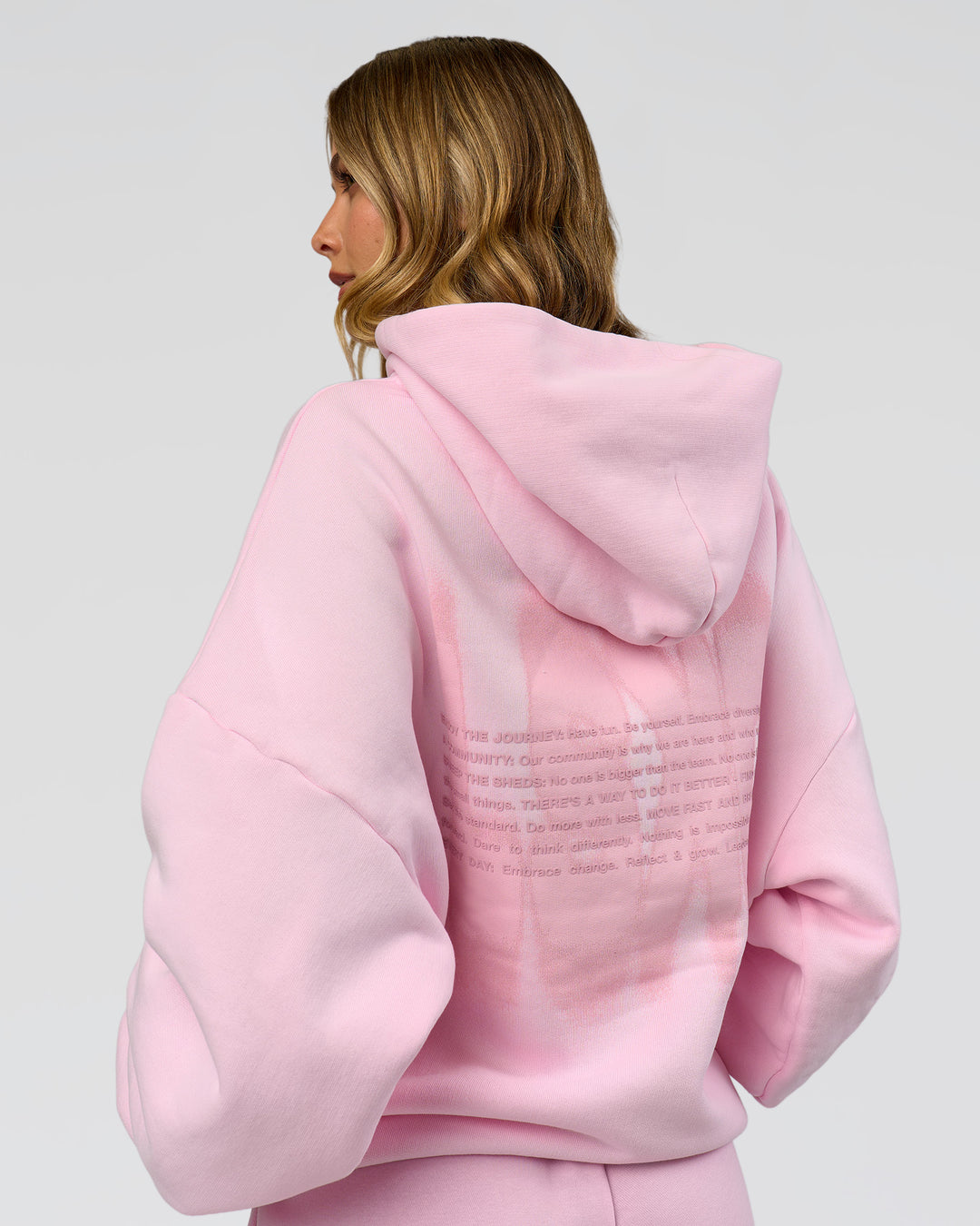 Woman wearing Memory In Motion Ultra Heavyweight Washed Hoodie - Marshmallow Washed | Model:Leilani | Size:XS - view 12