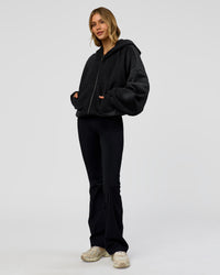 Woman wearing Memory in Motion Ultra Heavyweight Zip Thru Hoodie - Black Washed | Model:Leilani | Size:XS | Thumbnail Index: 8
