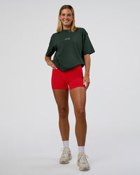Woman wearing Merry Journey FLXCotton Oversized Tee - Vital Green-White | Model:Amity | Size:XS | Thumbnail Index: 11