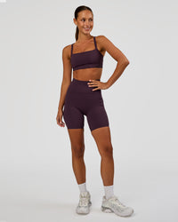 Woman wearing Momentum Corset Sports Bra - Midnight Plum | Model:Brylee | Size:XS | Thumbnail Index: 5