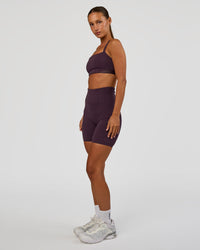Woman wearing Momentum Corset Sports Bra - Midnight Plum | Model:Brylee | Size:XS | Thumbnail Index: 7
