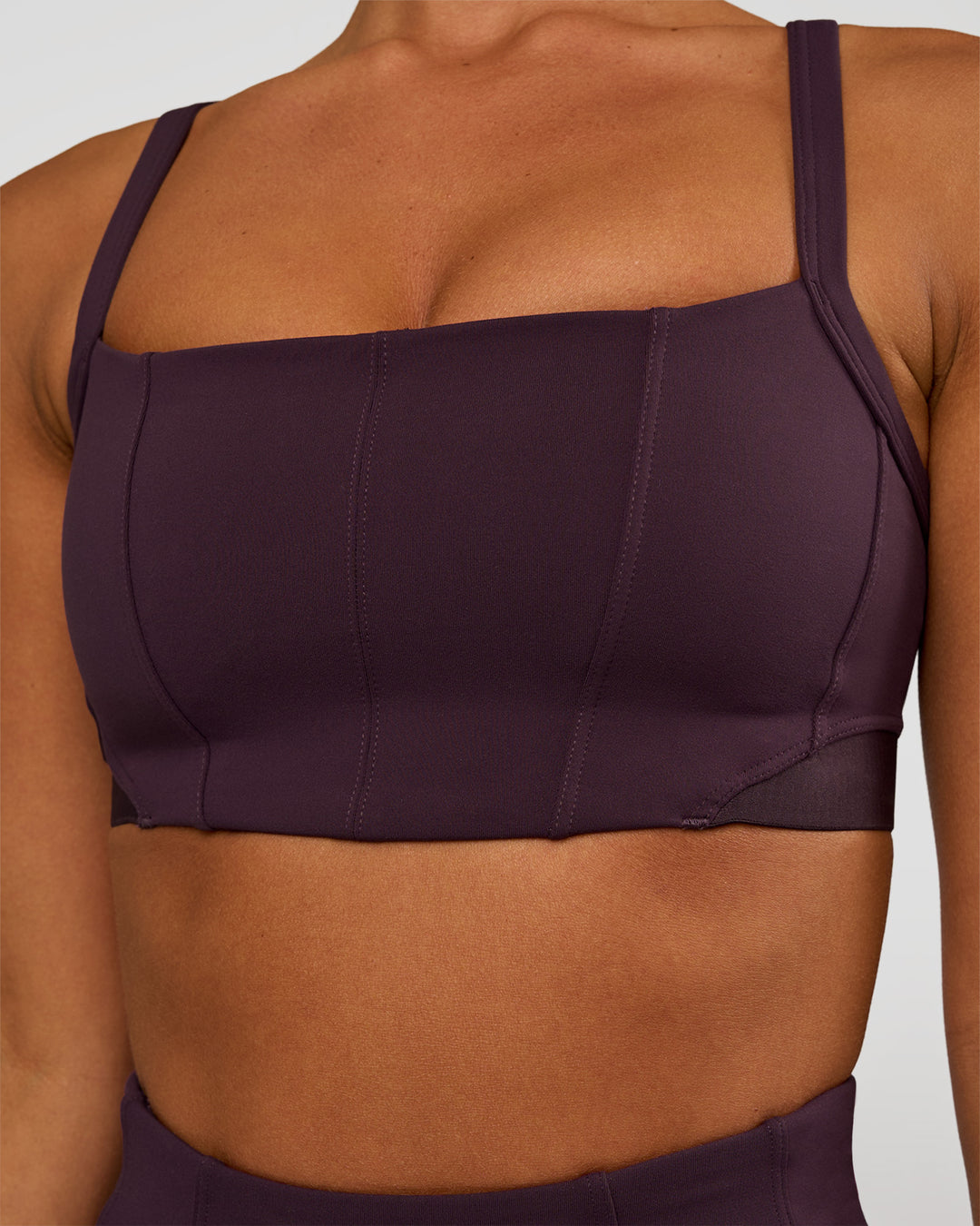 Woman wearing Momentum Corset Sports Bra - Midnight Plum | Model:Brylee | Size:XS - view 9