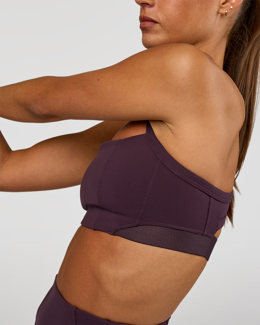 Woman wearing Momentum Corset Sports Bra - Midnight Plum | Model:Brylee | Size:XS - view 2