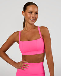 Woman wearing Momentum Corset Sports Bra - Sugar Plum | Model:Brylee | Size:XS | Thumbnail Index: 0